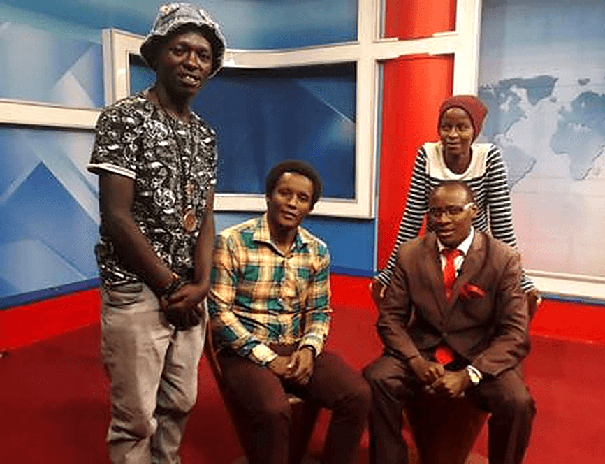 Rhema Compassion Organization team members during a television interview